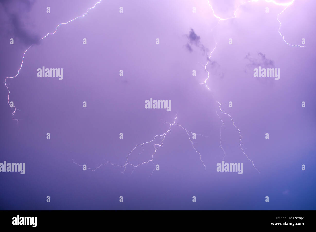 Lightning bolt in a purple sky Stock Photo