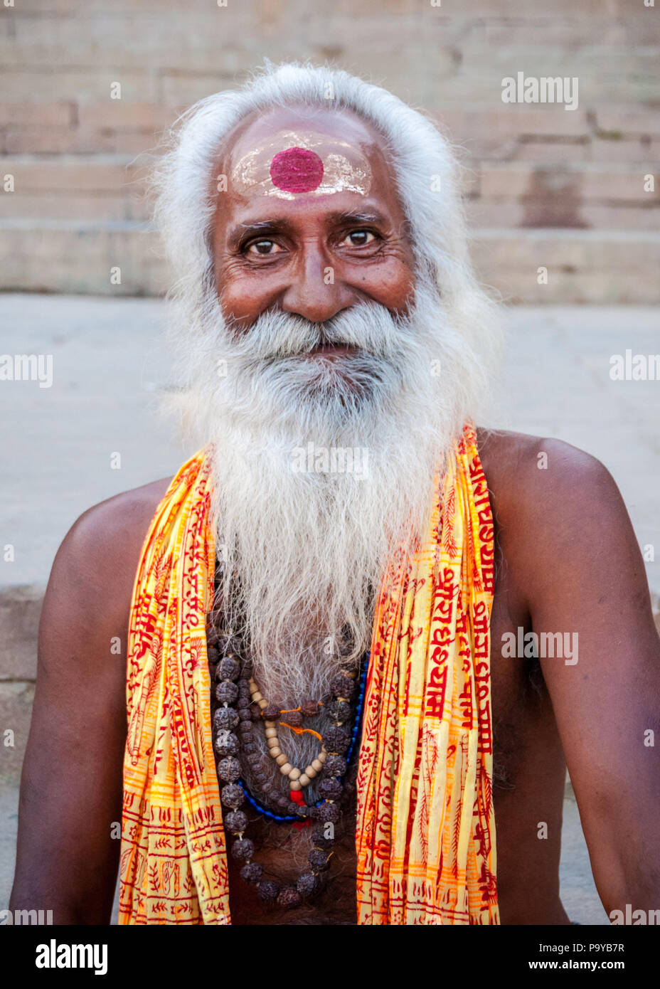 Smiling Sahu with white beard in Varenasi India Stock Photo