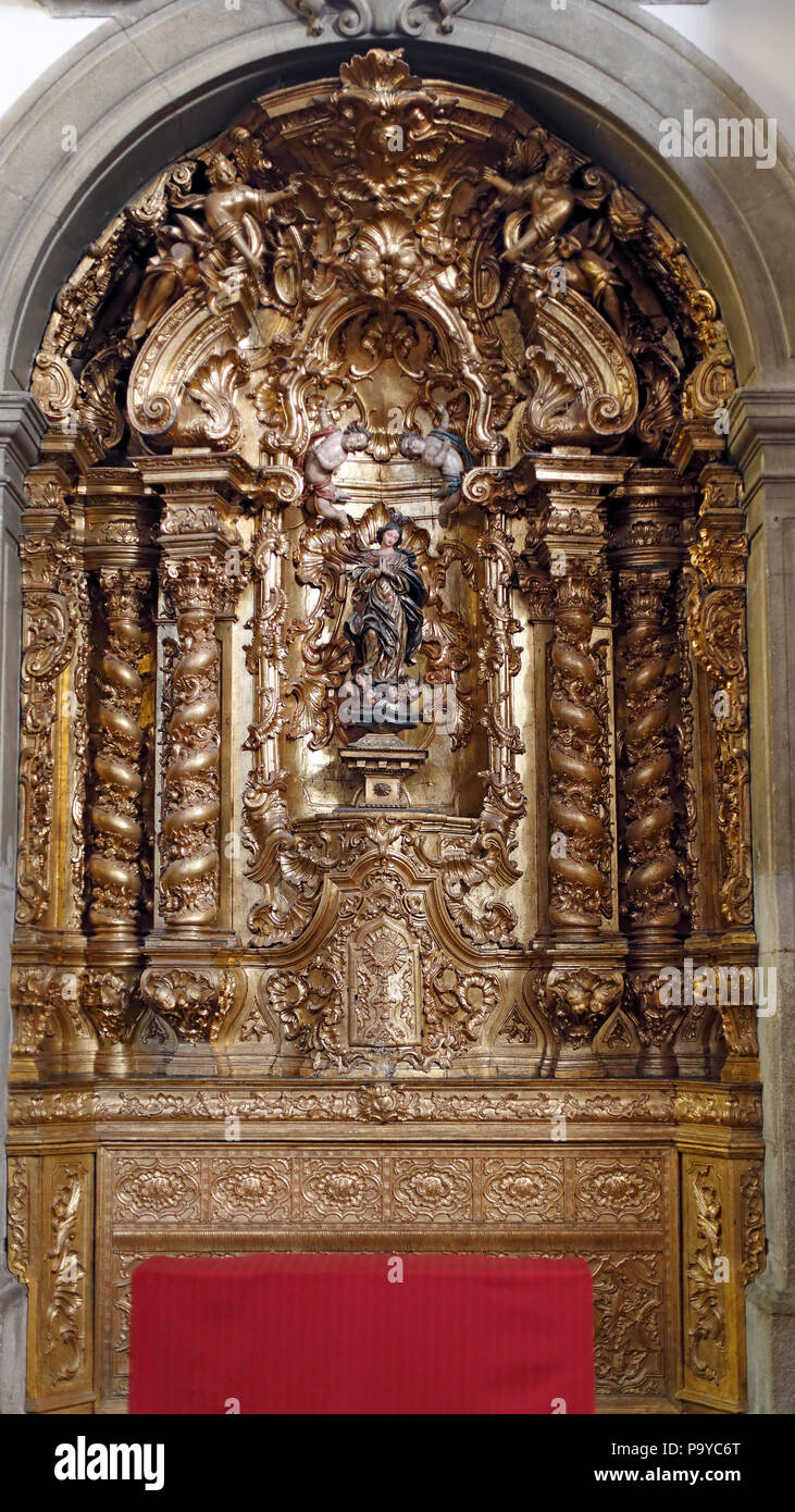 Porto, Portugal - March 4, 2015: Lateral altar of St. Nicholas Church dedicated to Our Lady. Church from XVII century, rebuilt in the eighteenth centu Stock Photo