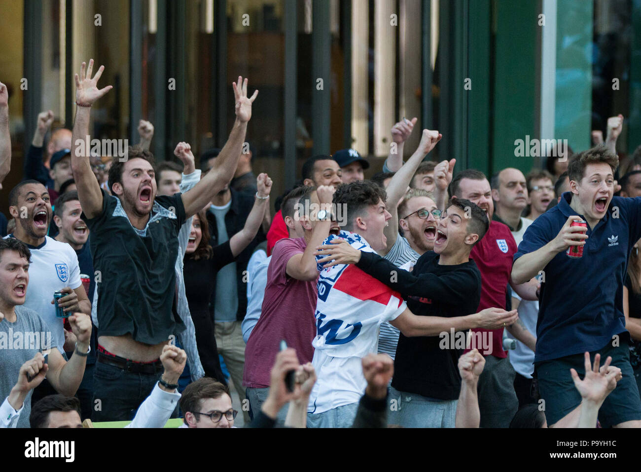 Football fans gather in Merchant Square in London's Paddington to watch 