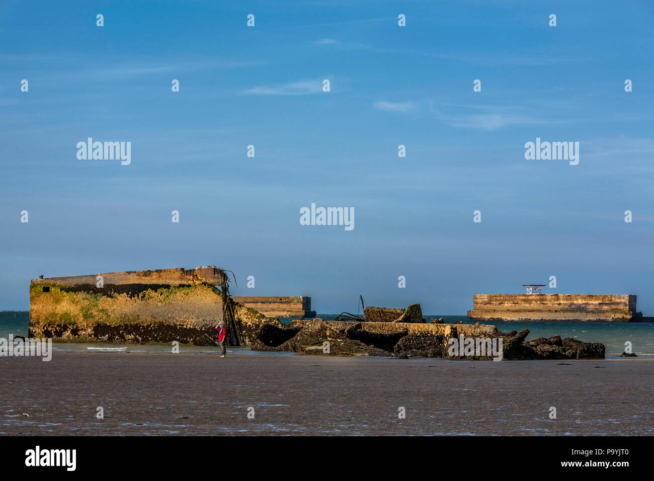 Remains of Mulberry temporary harbours constructed by invading forces after D-Day June 1944 to land supplies onto the beaches. Stock Photo