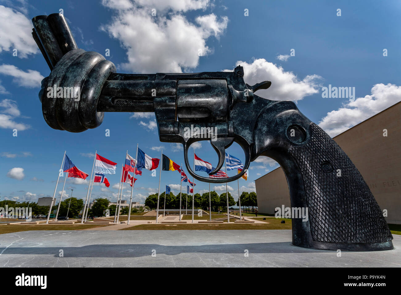 The Non-Violence Project NVP Knotted Gun sculpture at the 6 June Normandy landings museum Cean France Stock Photo
