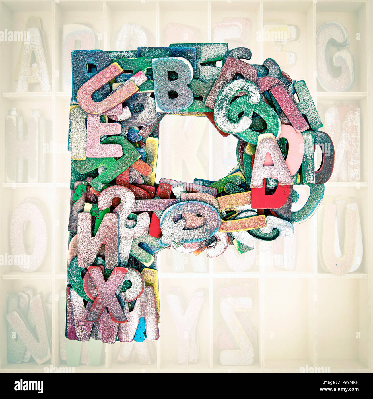 Lots Of Small Wooden Letters To Make Up The Letter P Stock Photo Alamy