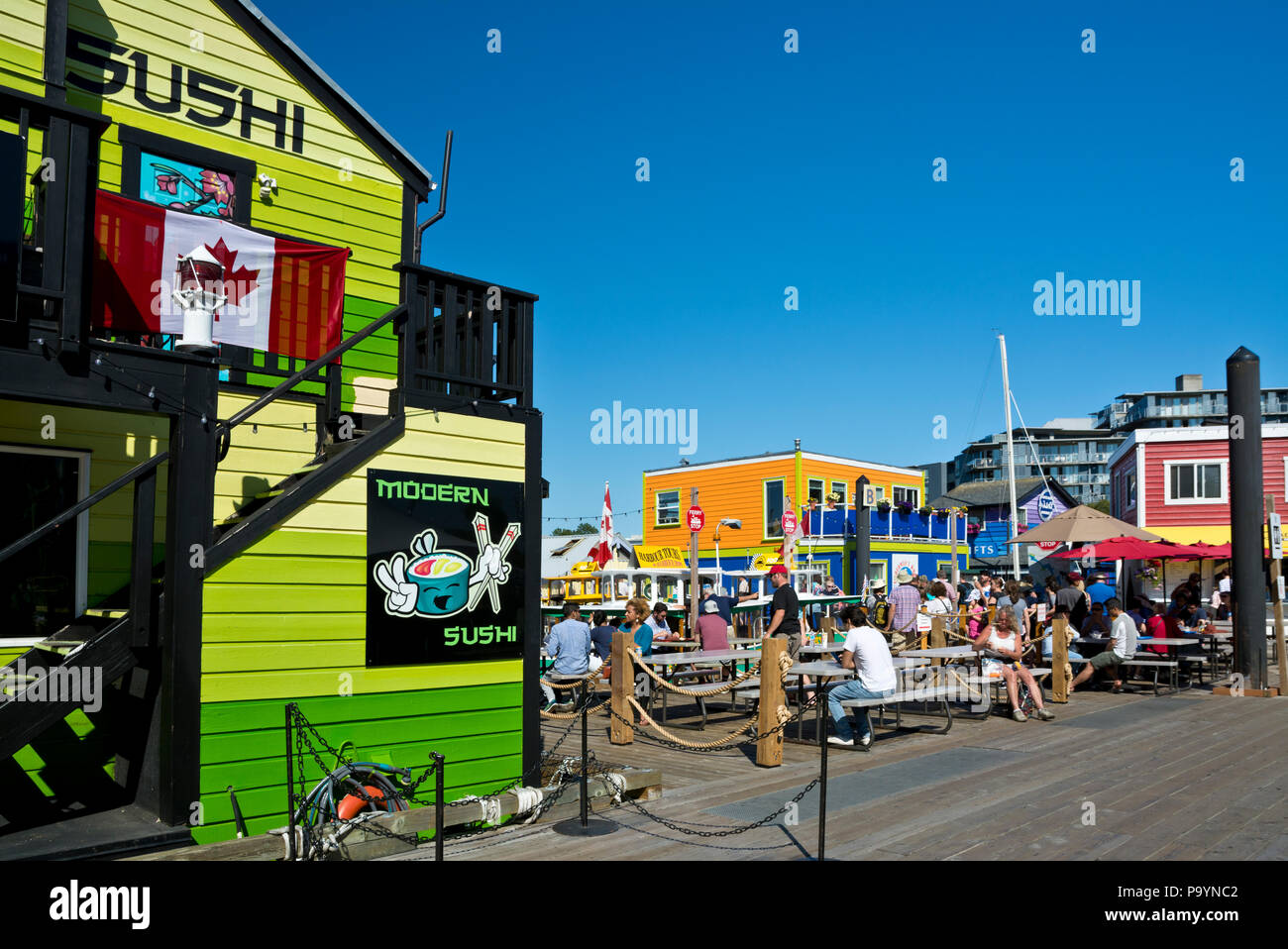 Fisherman's Wharf in Victoria, British Columbia, Canada.  Restaurants and boardwalk in Victoria, BC, Canada. Stock Photo