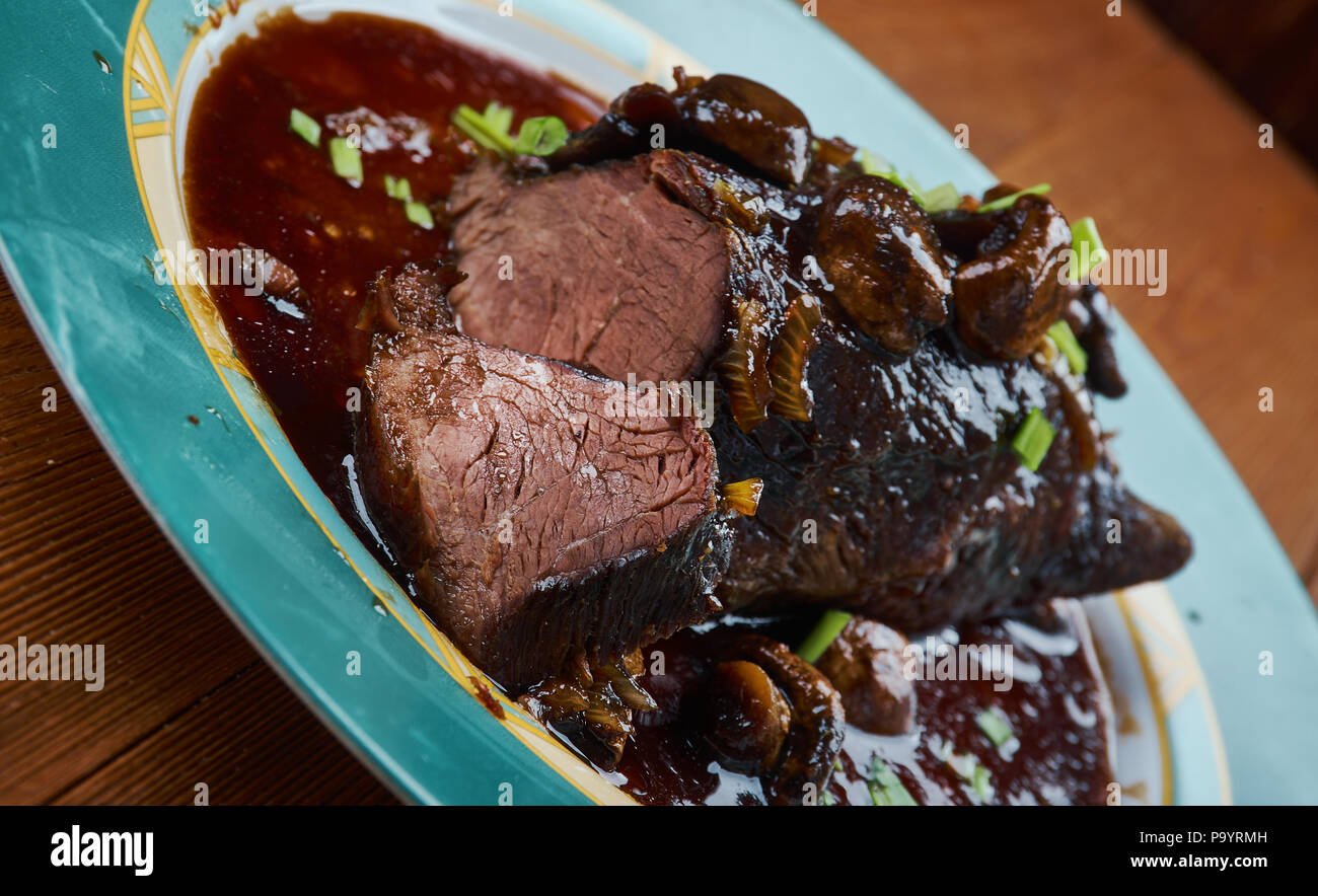 Slow Cooker Balsamic Glazed Roast Beef Stock Photo Alamy