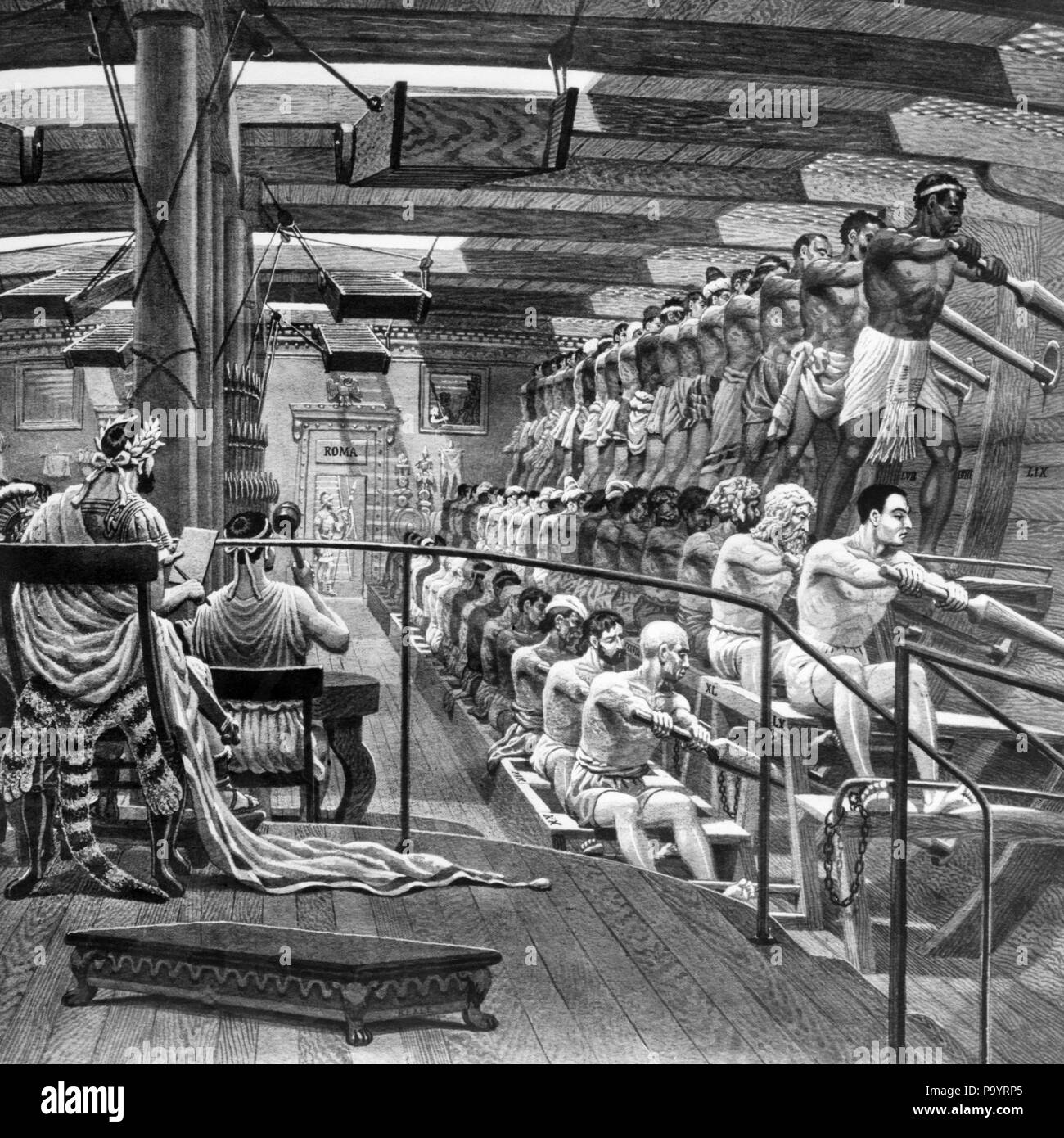 ROMAN TRIREME GALLEY  WAR SHIP INTERIOR WITH THREE TIERS OF MEN ROWING USUALLY FREE MEN OR SOMETIMES GALLEY SLAVES - a6008 SPL001 HARS WARSHIP ACTIVITY ANCIENT OCCUPATION PHYSICAL SLAVERY STRENGTH POWERFUL PRISONER TIERS OARS OCCUPATIONS RHYTHMIC FLEXIBILITY GALLEY MUSCLES OAR ROWERS BEALE COOPERATION SLAVE SYNCHRONIZED TOGETHERNESS BLACK AND WHITE MANPOWER OLD FASHIONED SLAVES Stock Photo