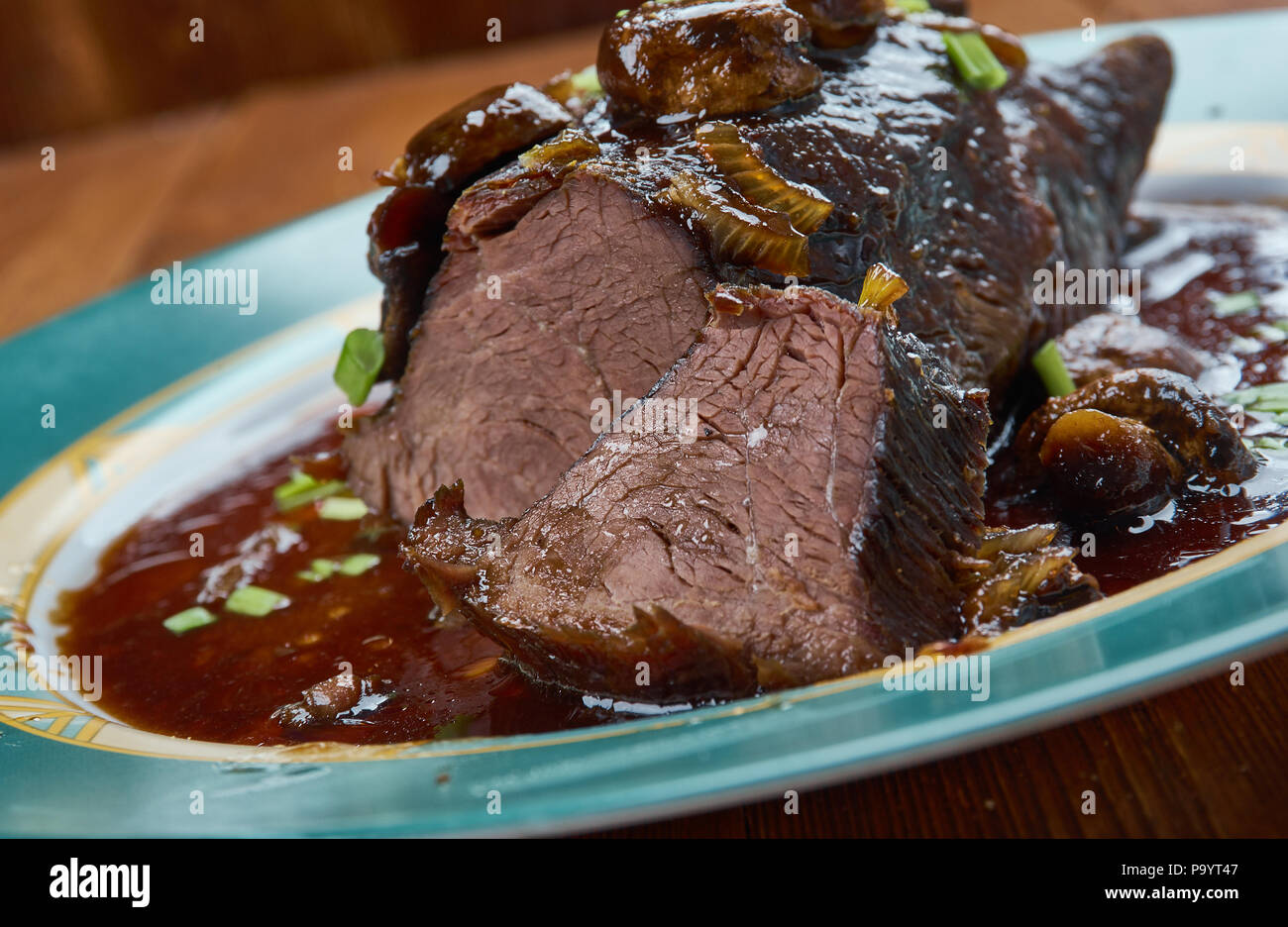 Slow Cooker Balsamic Glazed Roast Beef Stock Photo Alamy