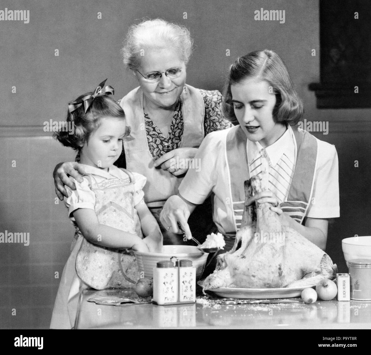 1940s 1950s MOTHER DAUGHTER GRANDMOTHER STUFFING THANKSGIVING TURKEY ...