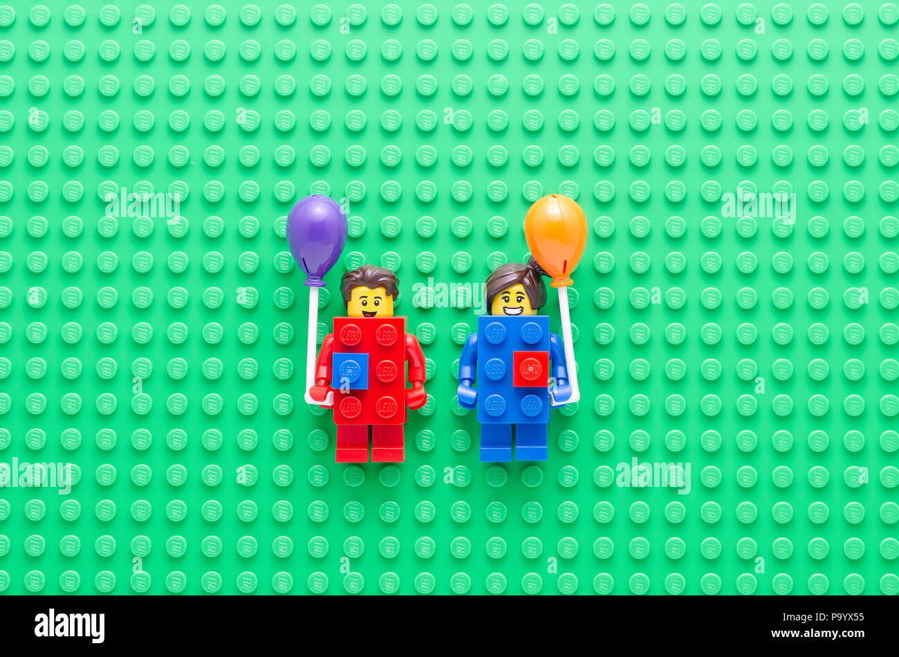 falanks mel Husarbejde lego red and blue brick minifigure holding a balloon. Lego minifigures are  manufactured by The Lego Group Stock Photo - Alamy