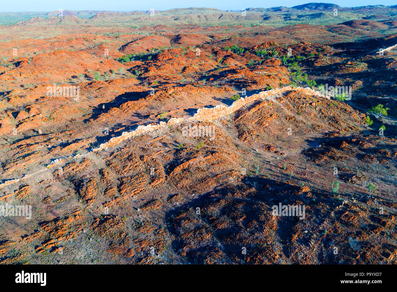 Aerial view of the China Wall, a sub vertical quartz vein protruding from the ground, Halls Creek, Kimberley,Northwest Australia Stock Photo