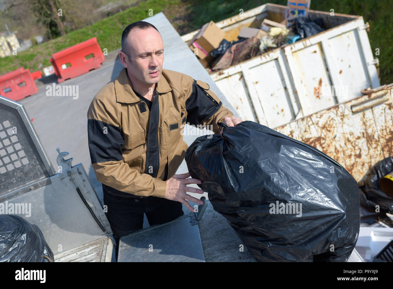 the bin collector Stock Photo Alamy