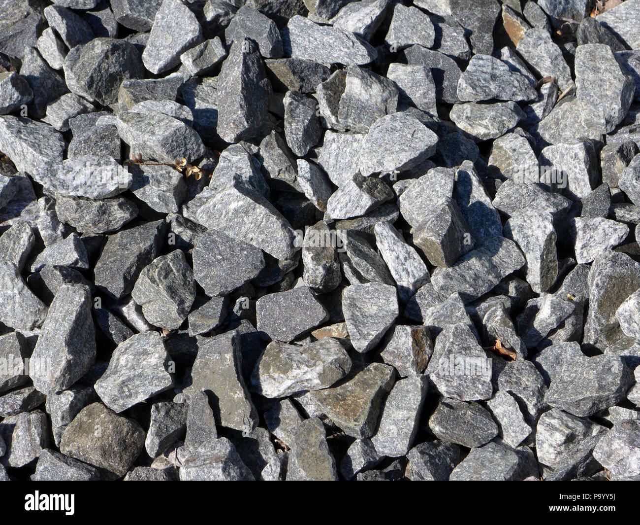 Crushed stones for railroad bed. Stock Photo