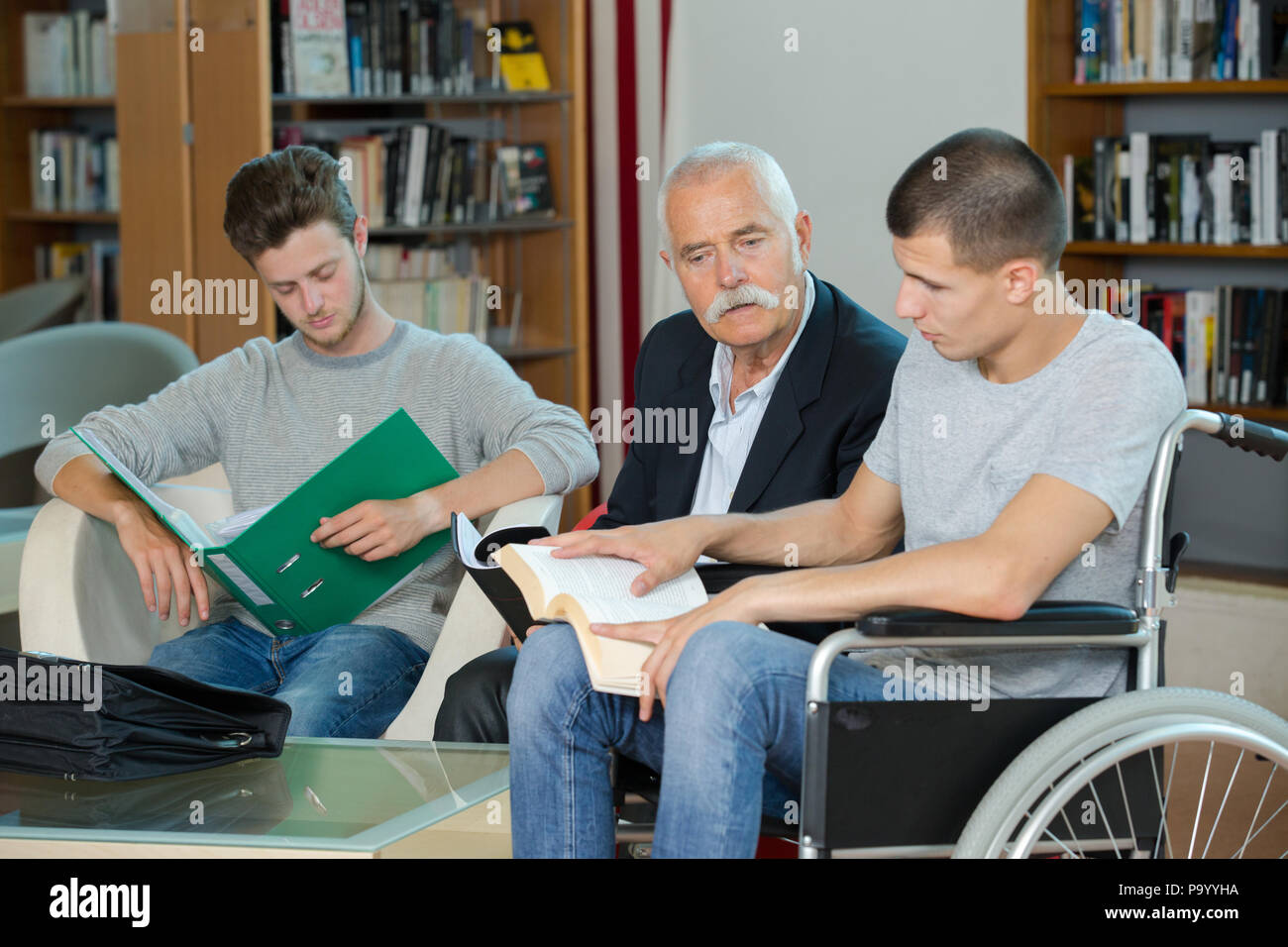 men in the library Stock Photo - Alamy