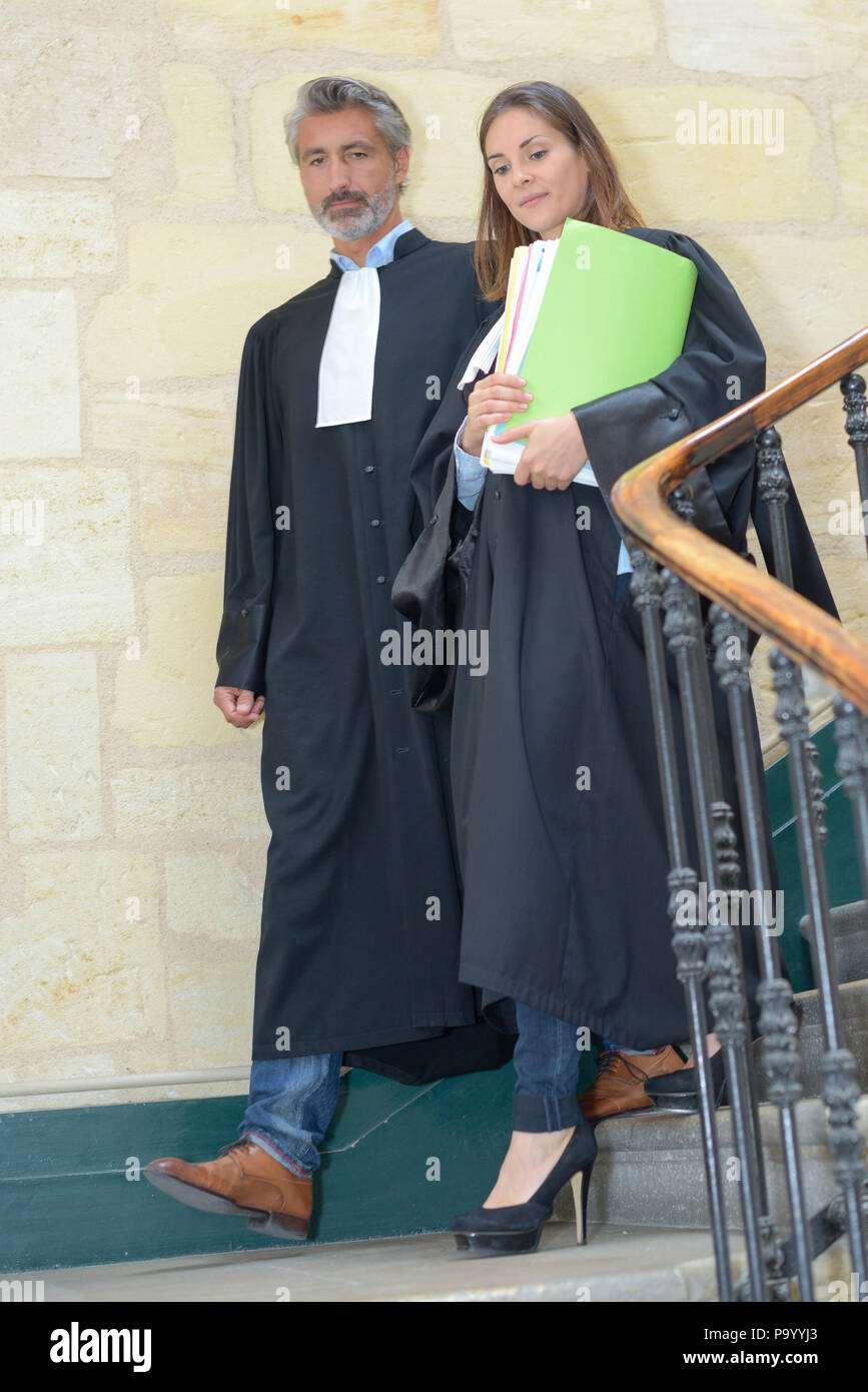 judges walking down staircase Stock Photo Alamy
