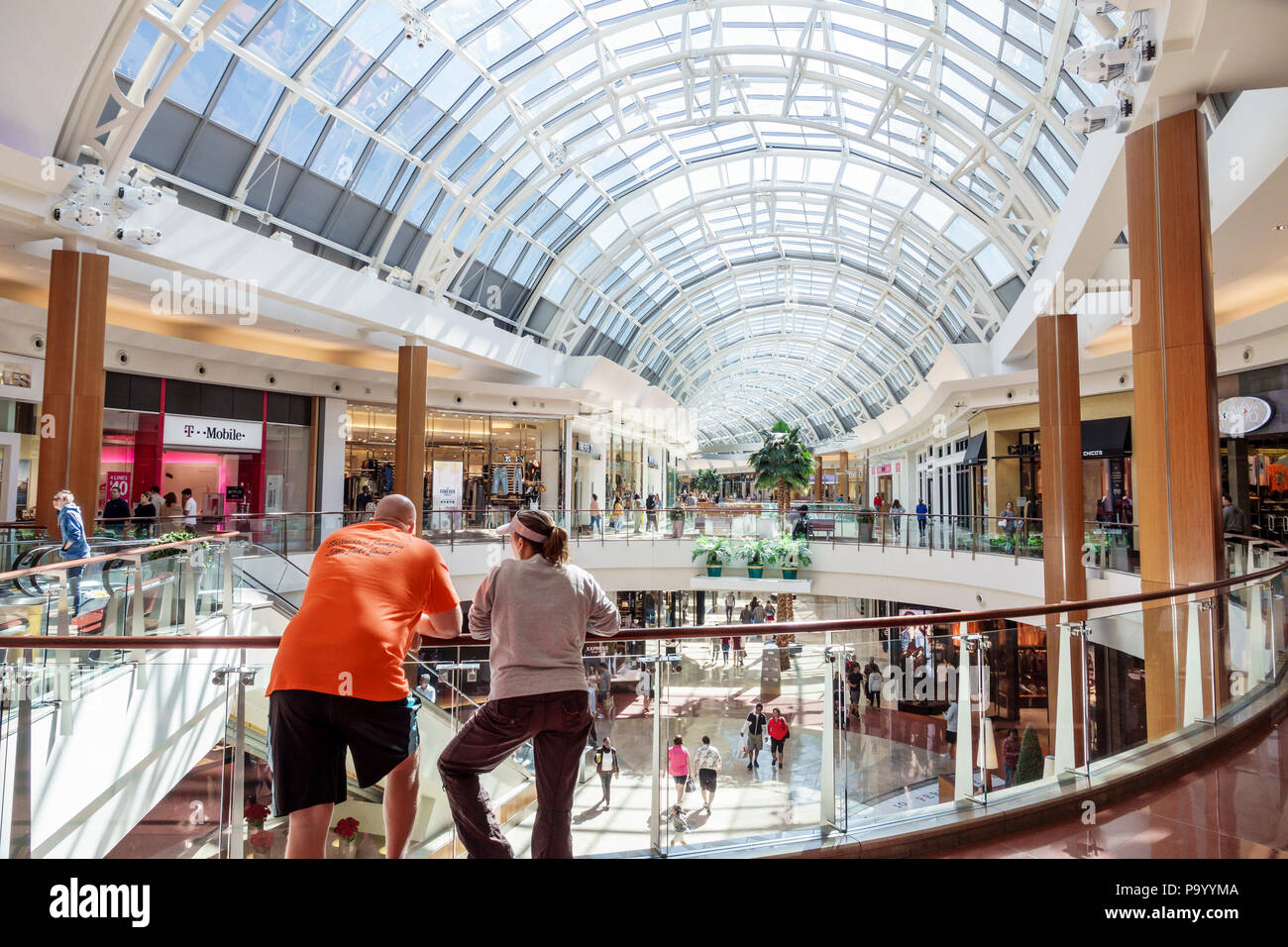 Orlando Florida,The Mall at Millenia,shopping shops markets marketplace  selling retail stores businesses,atrium skylight veranda interior inside  Stock Photo - Alamy