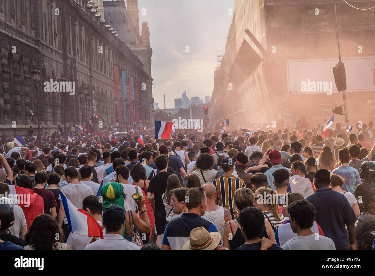Crowd in Rue de Rivoli in Paris going to the Champs Elysees after the 2018 World Cup Final Game Stock Photo