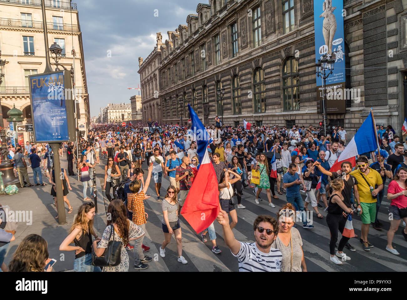 Crowd in Rue de Rivoli in Paris going to the Champs Elysees atfer the 2018 World Cup Final Game Stock Photo