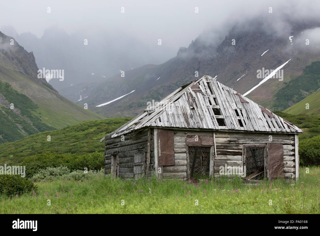 Log Cabin in Kamchatka wilderness, Russia Stock Photo