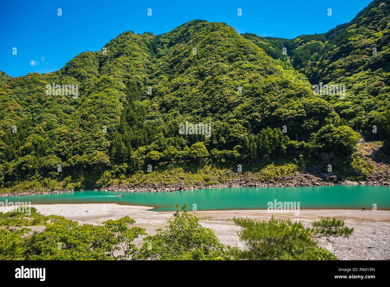 Kumano Kodo pilgrimage route. Kumano-gawa river boat tour. Traditional wooden flat bottom boat. . Wakayama Prefecture.Kansai region. Japan Stock Photo