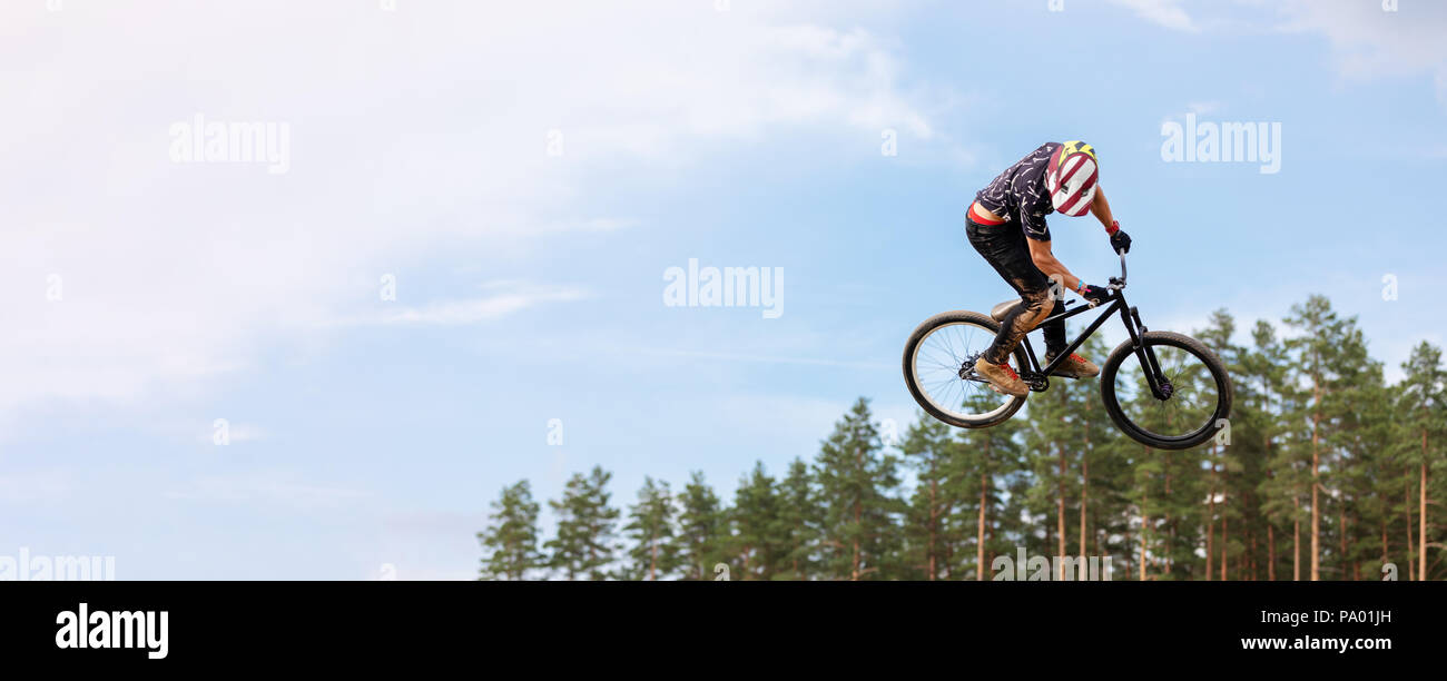 rider is jumping high on a bicycle. copy space Stock Photo
