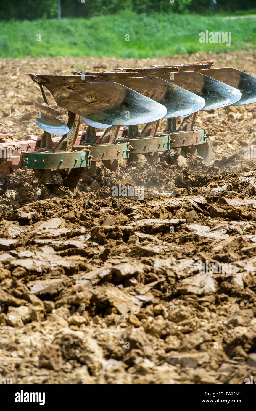 Farmer on tractor plow field, France, Europe Stock Photo - Alamy