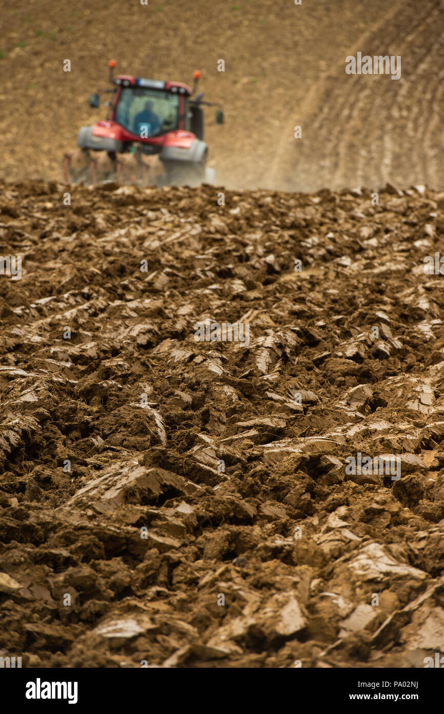 Farmer on tractor plow field, France, Europe Stock Photo - Alamy