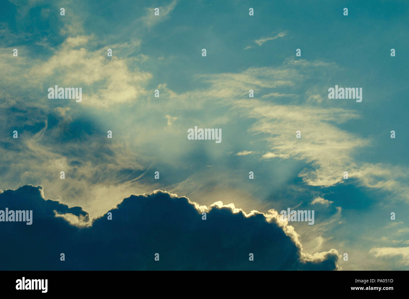 Dark blue grey layered clouds sky cover sun before raining. Stock Photo