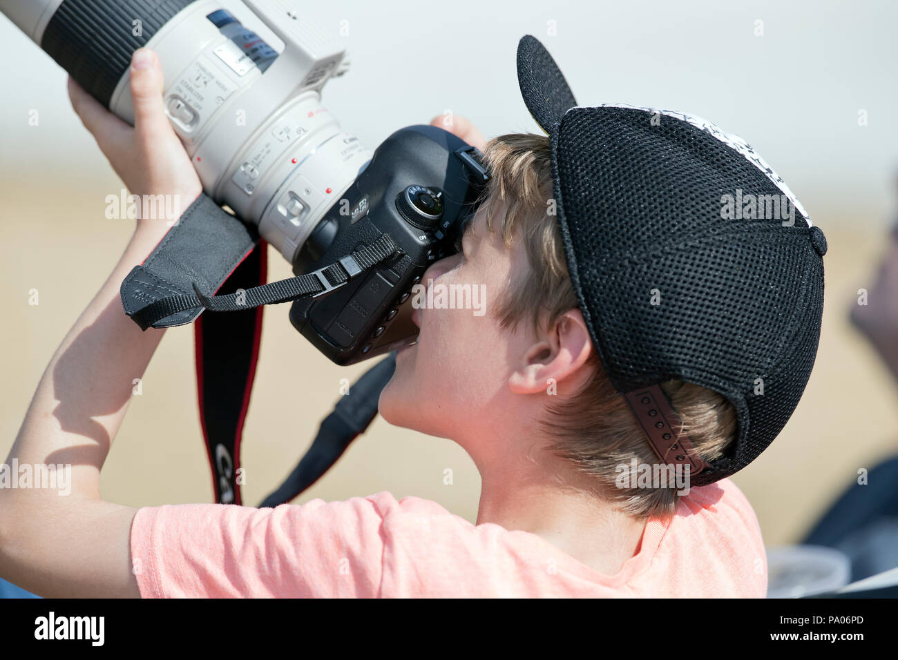 RAF RIAT 2018 Young man using a camera to photograph aircraft Stock Photo