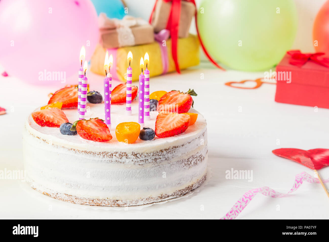 Birthday Healthy Yougurt Berry Cake With Candles On Colorful Party Background With Bright Party Tools Decoration Gefts And Balloons Happy Holiday Stock Photo Alamy