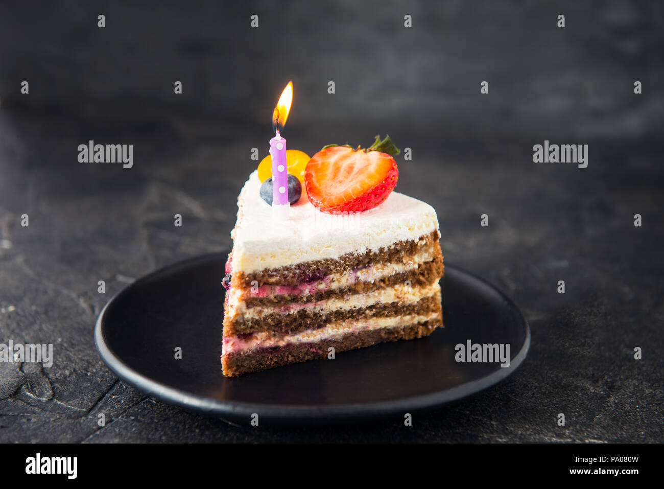 Piece Of Birthday Healthy Yougurt Cake With Fresh Berries And Burning Candle On The Black Plate On Dark Gray Black Stone Background Happy Holiday De Stock Photo Alamy Piece Of Birthday Healthy Yougurt Cake With Fresh Berries And Burning Candle On The Black Plate On Dark Gray Black Stone Background Happy Holiday De Stock Photo Alamy