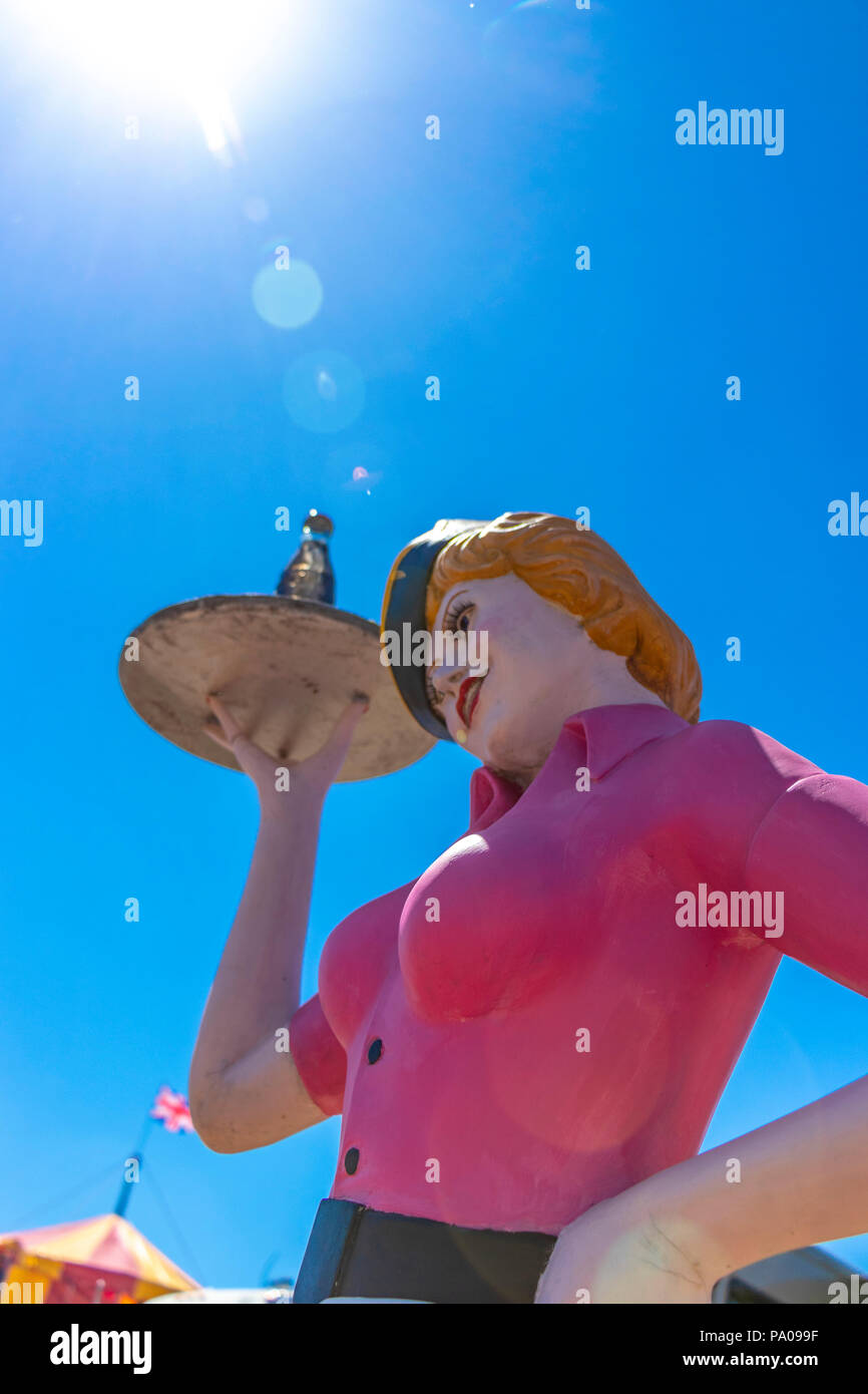 vintage mannequin of female fast food barhop server on roller skates at