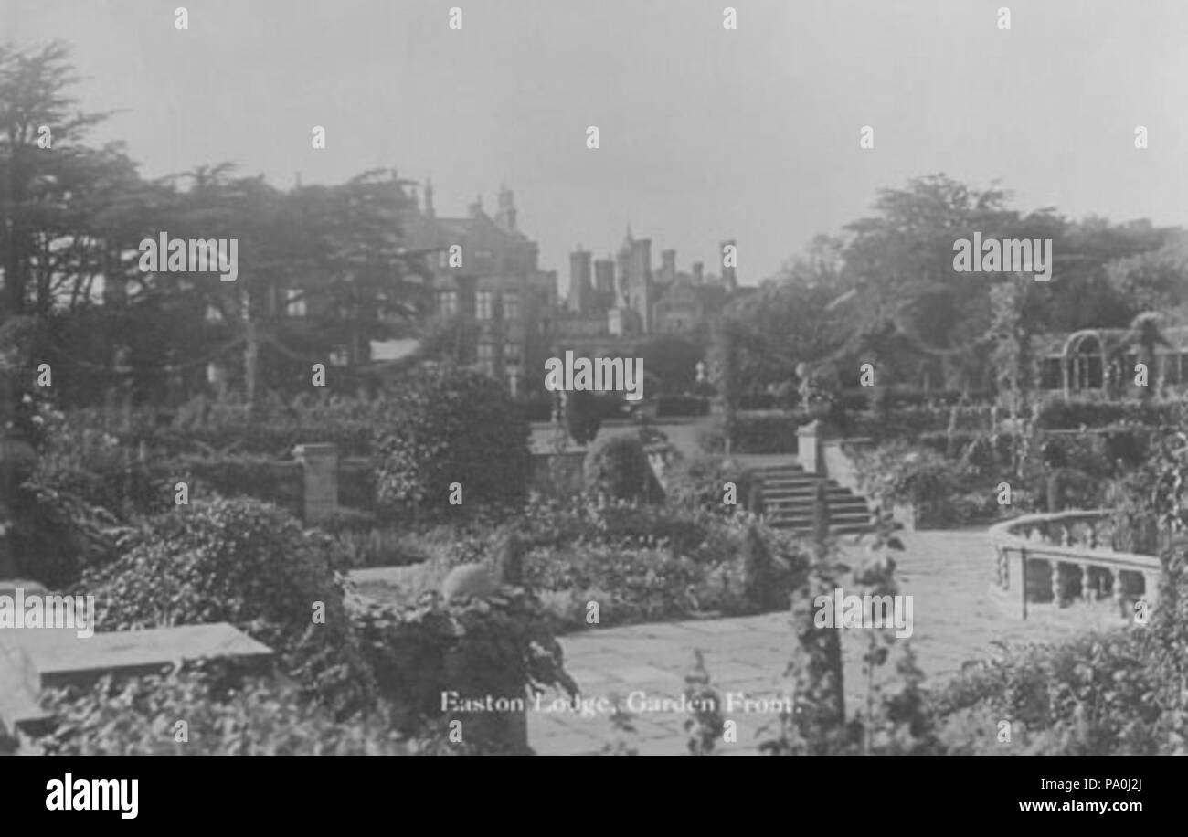 . English: The north face and sunken Italian Garden of Easton Lodge, a house partly burnt down in 1918 and remains finally demolished in 1947 (this house a rebuild of an earlier house burnt down in 1847), at Little Easton, Essex, England. Easton Lodge was built by Henry Maynard in 1597. This later-built house, with gardens designed by Harold Peto, was occupied by 'champagne socialist' and socialite Frances Evelyn Maynard (1861-1938), Countess of Warwick, who was born at Easton Lodge and lived there her whole life. before 1918 600 Easton Lodge sunken Italian Garden pre-1918 Stock Photo