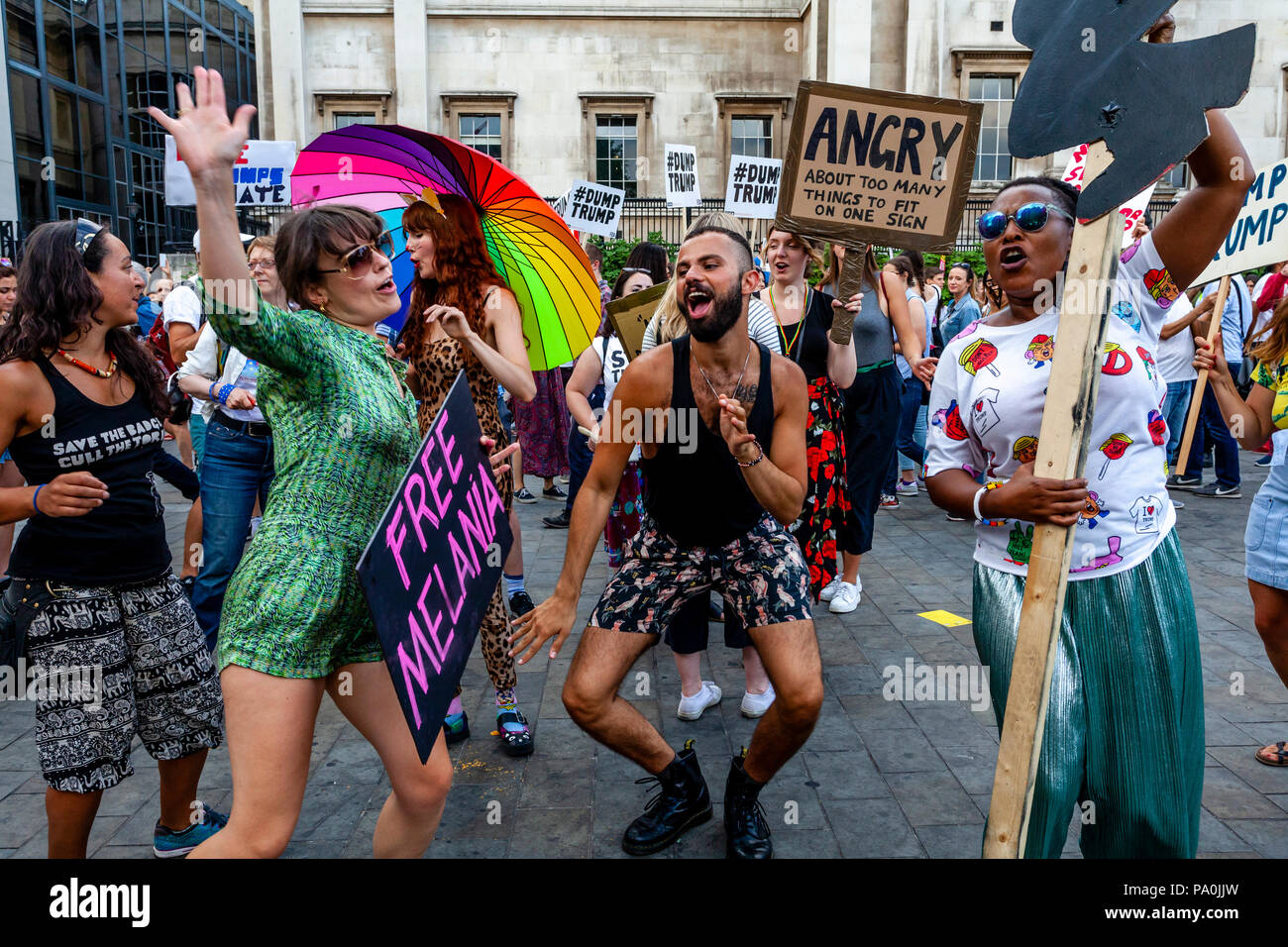 Anti Trump Protestors Dancing In Trafalgar Square, London, England Stock Photo