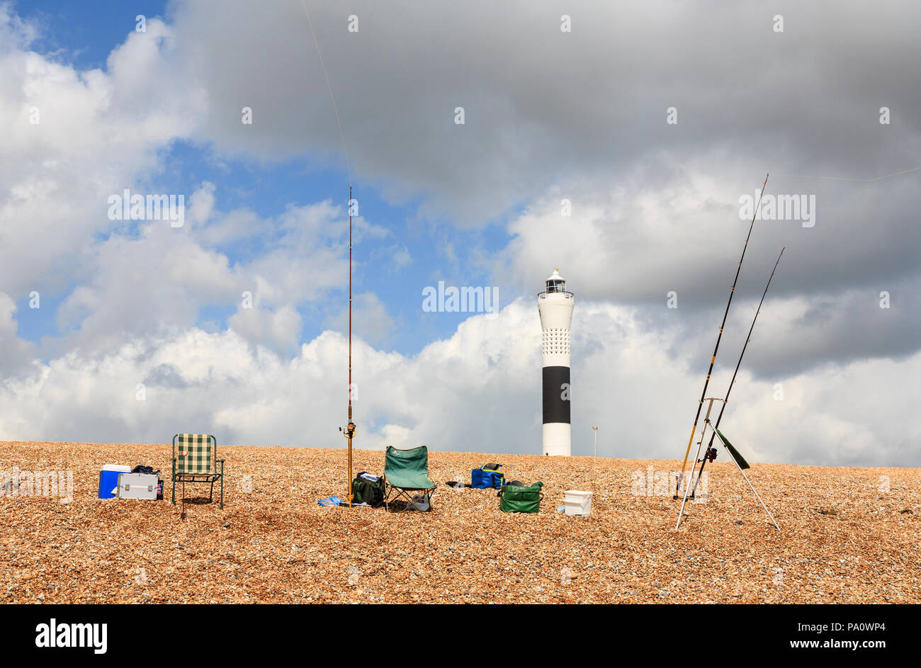 Fishing rods set up for angling from the seashore in front of the ...
