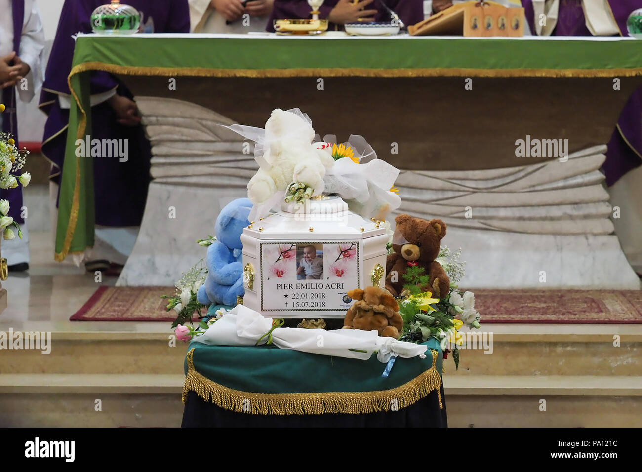Rossano, Italy. 19th July, 2018. Rossano, the funeral of Stanislao Acri, a 35-year-old lawyer, his wife Daria Stella Olivo, aged 35, and their little 6-month-old Pier Antonio Acri, who died on 15 July in a terrible accident on the A1 near Frosinone. They were coming back from Rome on board their Fiat Punto and were hit by a van. Stanislao Acri had been nominated for mayor of Rossano for the Movimento 5 Stelle.19/07/2018, Rossano, Italy Credit: Independent Photo Agency Srl/Alamy Live News Stock Photo