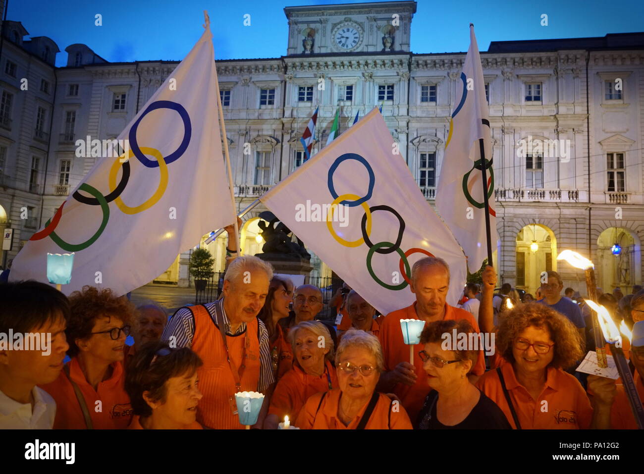 Turin, Italy. 19th |July, 2018. Torchlight procession in support of Turin's Olympic candidate city for the 2026 Winter Games. Stock Photo