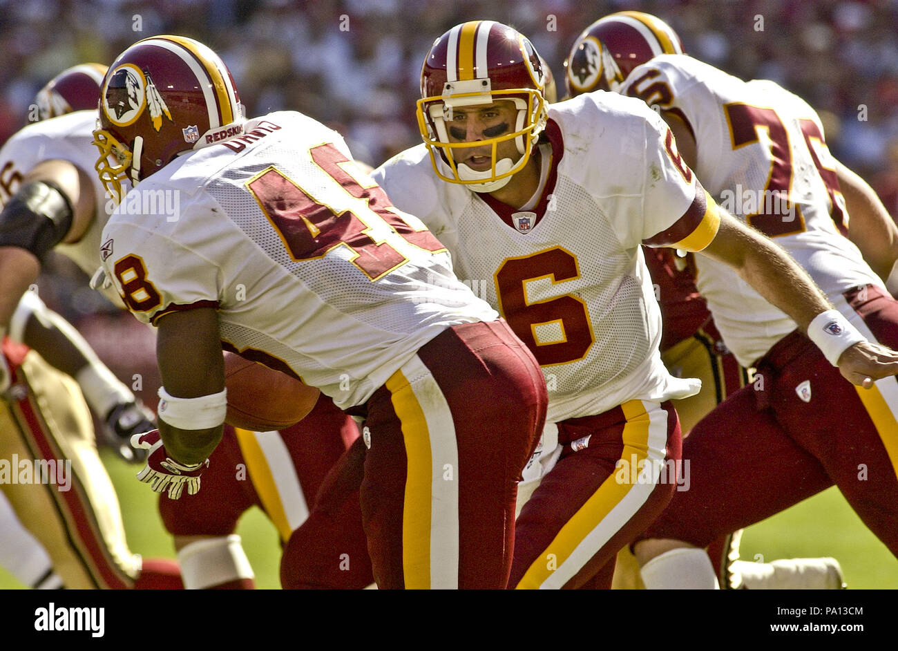 San Francisco, California, USA. 22nd Sep, 2002. Washington Redskins  quarterback Danny Wuerffel (17) hands off to running back Stephen Davis  (48) on Sunday, September 22, 2002, in San Francisco, California. The 49ers