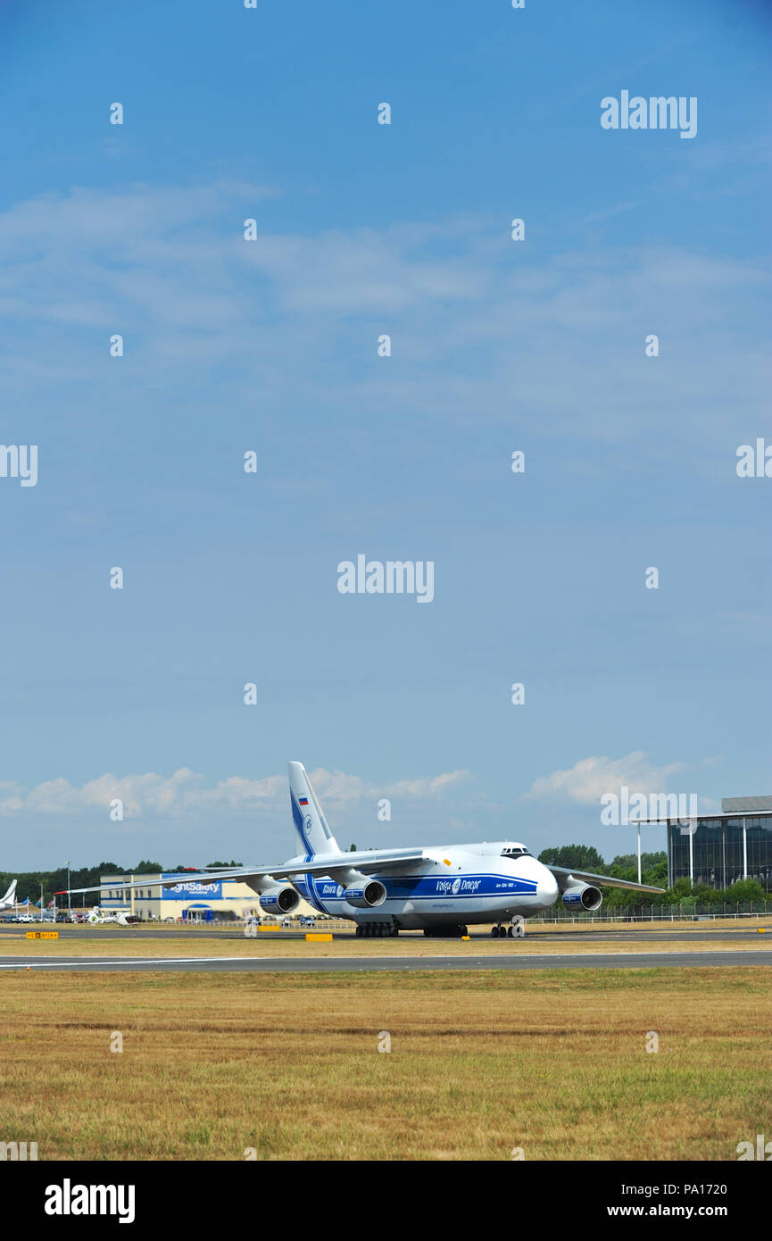 Farnborough, Hampshire, UK. 19th July, 2018. An Antonov An-124 strategic airlift jet aircraft taking off on day four of the Farnborough International Airshow (FIA) which is taking place in Farnborough, Hampshire, UK.  The air show, a biannual showcase for the aviation industry, is the biggest of it's kind and attracts civil and military buyers from all over the world. trade visitors are normally in excess of 100,000 people. The trade side of the show runs until July 20 and is followed by a weekend of air displays aimed at the general public.   Credit: Michael Preston/Alamy Live News Stock Photo