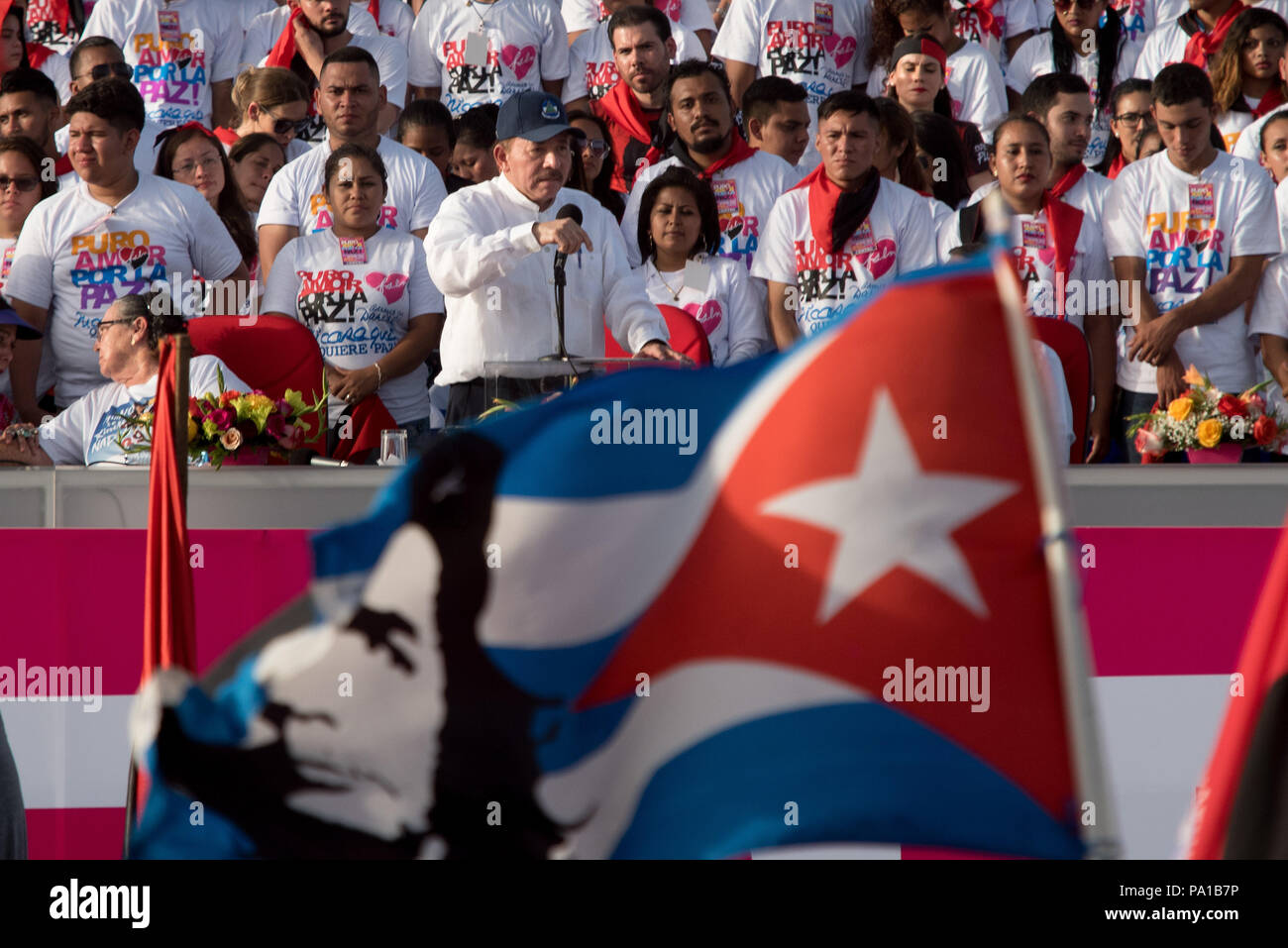 Managua, Nicaragua. 19th July, 2018. President Daniel Ortega (C) speaking to supporters during an event in conmemoration of the 39th anniversary of the Sandinista revolution. The Nicaraguan president has accused the country's Catholic church of being part of an attempted coup against his government. According to Ortega, the country's Catholic bishops aren't intermediaries in the political crisis, but rather part of a putschist conspiracy. Credit: Carlos Herrera/dpa | usage worldwide/dpa/Alamy Live News Stock Photo