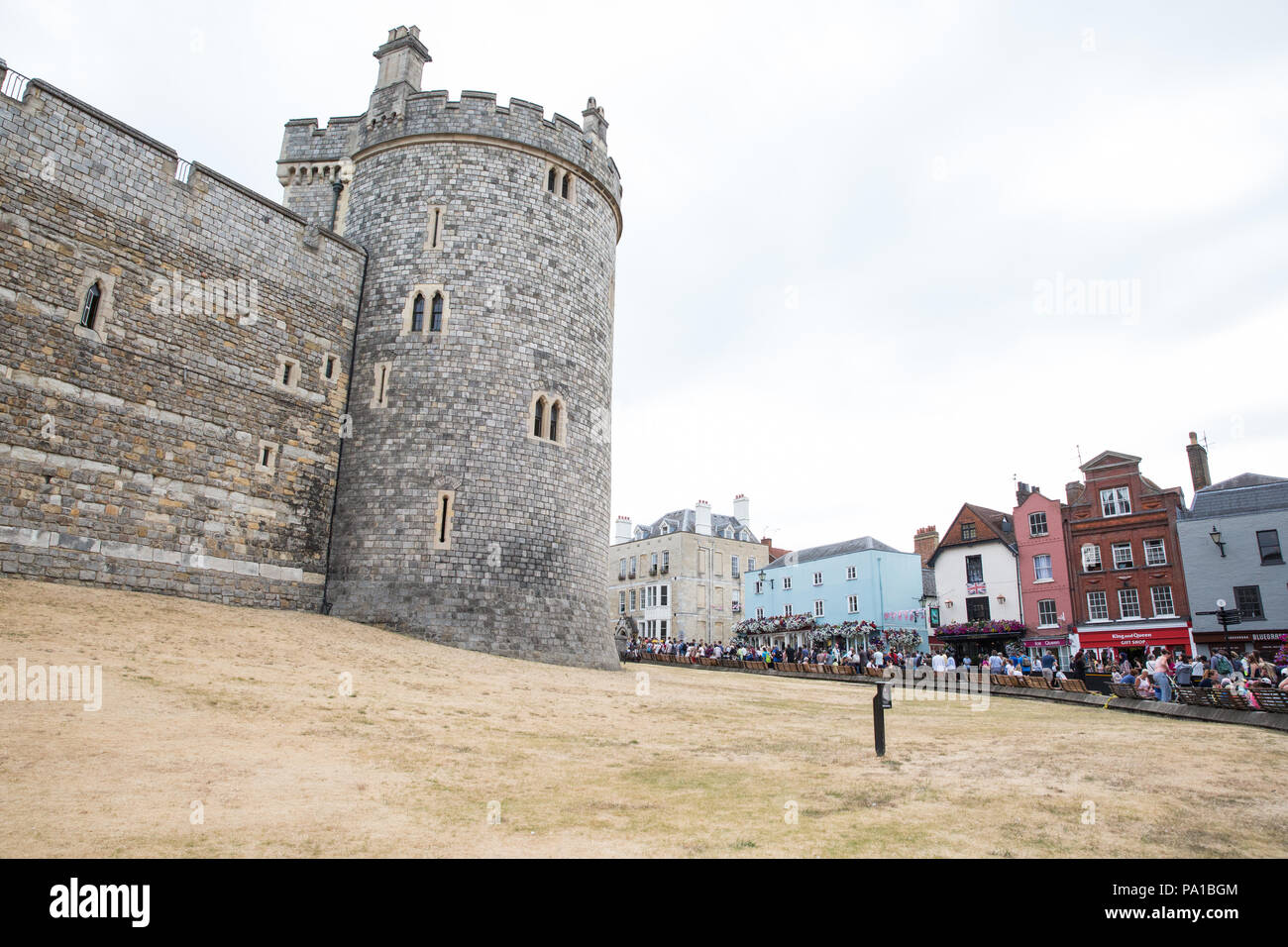 Windsor, UK. 20th July, 2018. Yellowed grass around Windsor Castle following the UK's longest heatwave for more than forty years. The grass around Windsor Castle was a lush green at the time of the wedding of the Duke and Duchess of Sussex in May. Credit: Mark Kerrison/Alamy Live News Stock Photo
