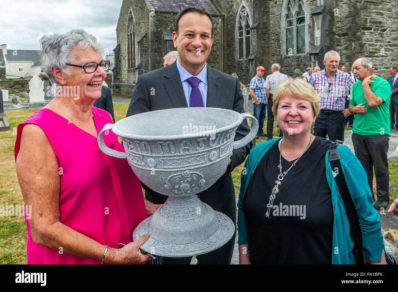 Dunmanway, West Cork, Ireland. 20th July, 2018. Taoiseach Leo Varadkar visited Dunmanway today to see the birthplace and final resting place of Sam Maguire. He also visited the Sam Maguire Bells in St. Mary's Church. The Taoiseach was shown a knitted version of the Sam Maguire trophy, made by local ladies. Credit: AG News/Alamy Live News. Stock Photo