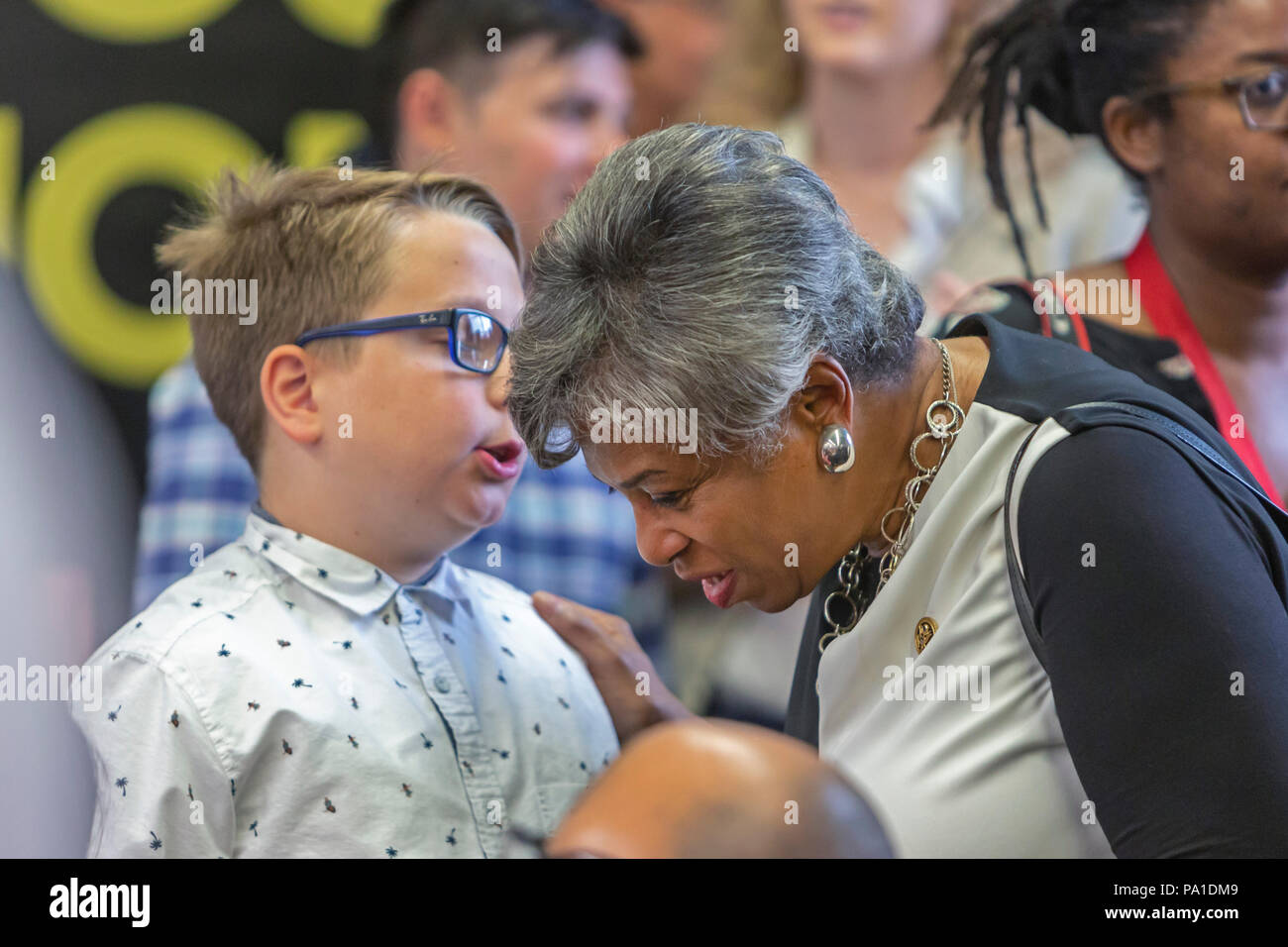 Detroit, Michigan USA - 20 July 2018 - Congresswoman Brenda Lawrence speaks with a young constituent as union members rally to save their pensions. Credit: Jim West/Alamy Live News Stock Photo