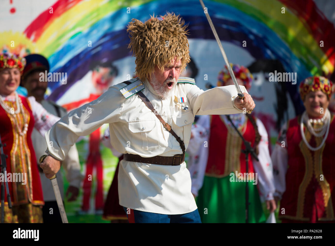 Russian man waving sword in performance Stock Photo