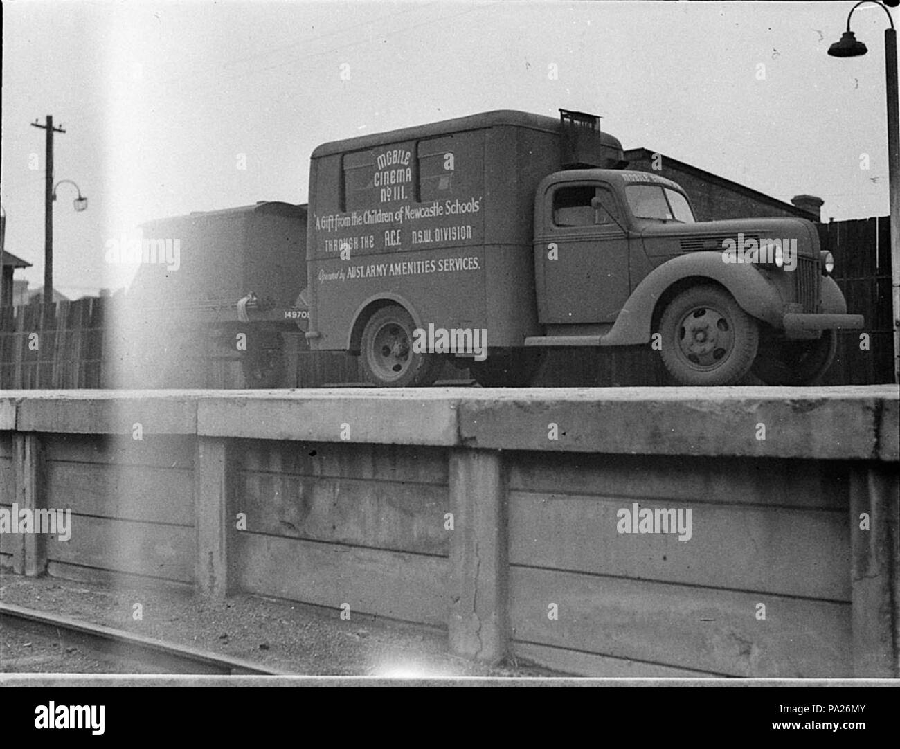 260 SLNSW 34623 Two Ford mobile cinema units nos 28 111 gifts from Newcastle through ACF NSW Div operated by Australian Army Amenities Services for Miss Davidson Australian Comforts Fund Stock Photo