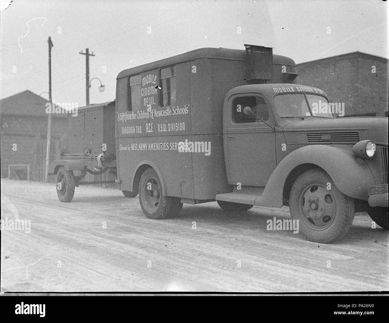 260 SLNSW 34621 Two Ford mobile cinema units nos 28 111 gifts from Newcastle through ACF NSW Div operated by Australian Army Amenities Services for Miss Davidson Australian Comforts Fund Stock Photo
