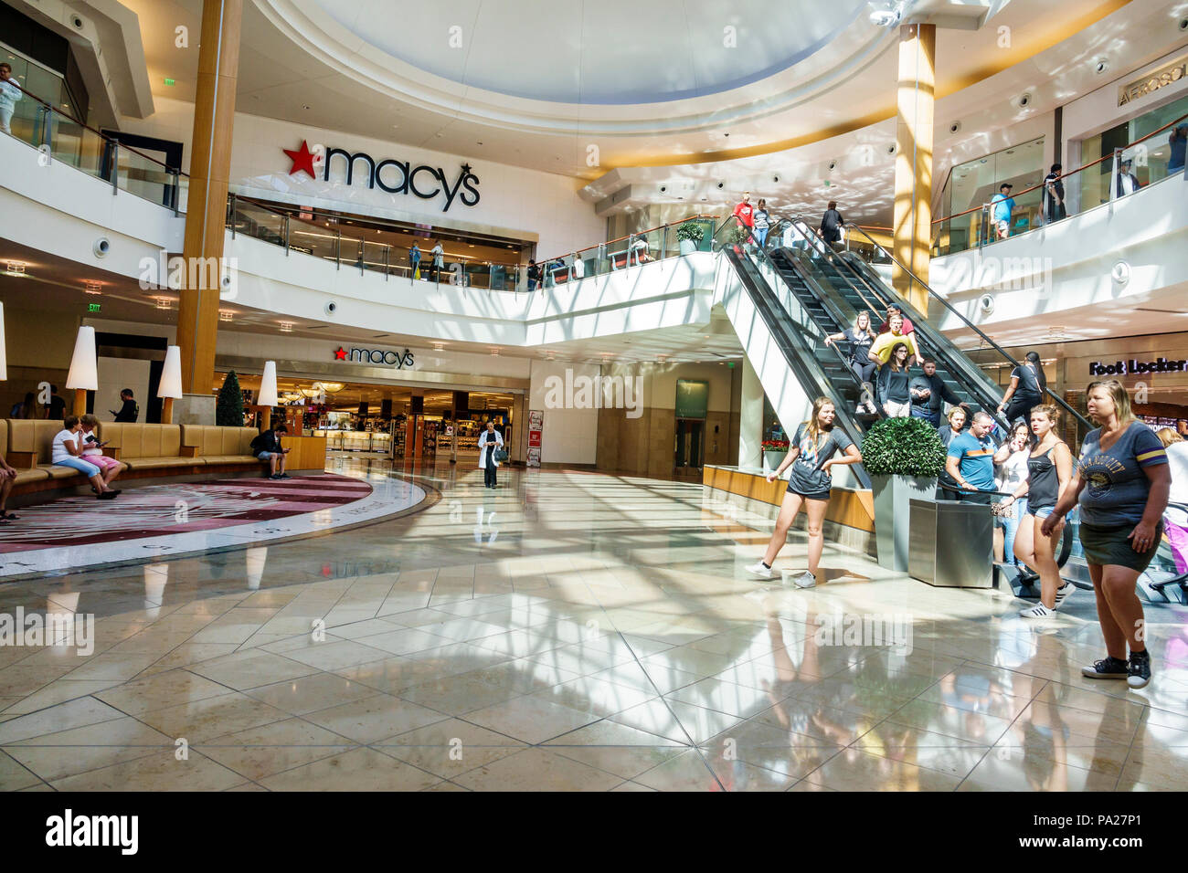 Orlando Florida The Mall at Millenia shopping atrium escalator girl teen Macy&#39;s department store ...