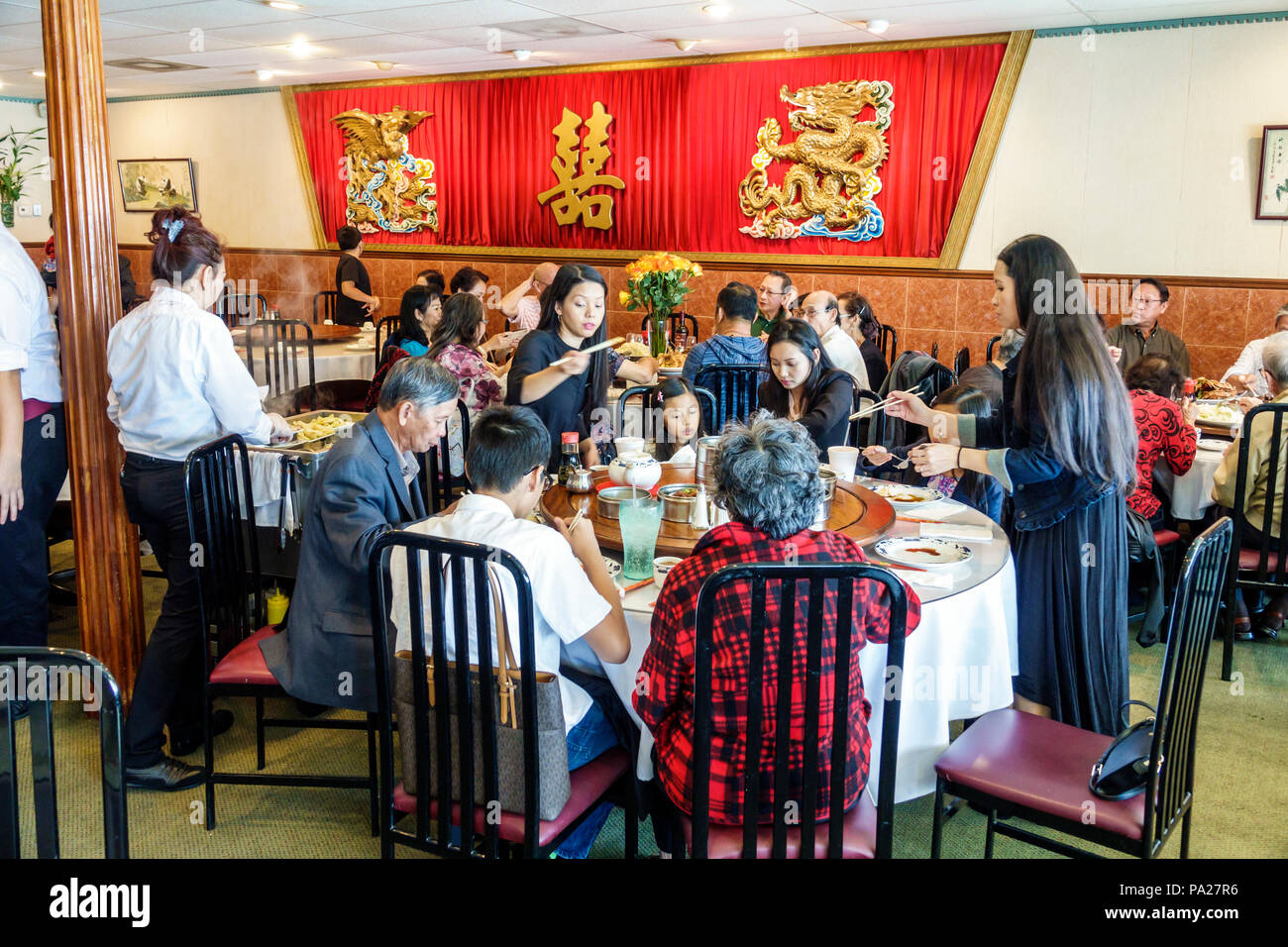 Orlando Florida,Chinatown,Lam's Garden Chinese,restaurant restaurants food dining cafe,dim sum,dining,large family,table,Asians man men,woman female w Stock Photo