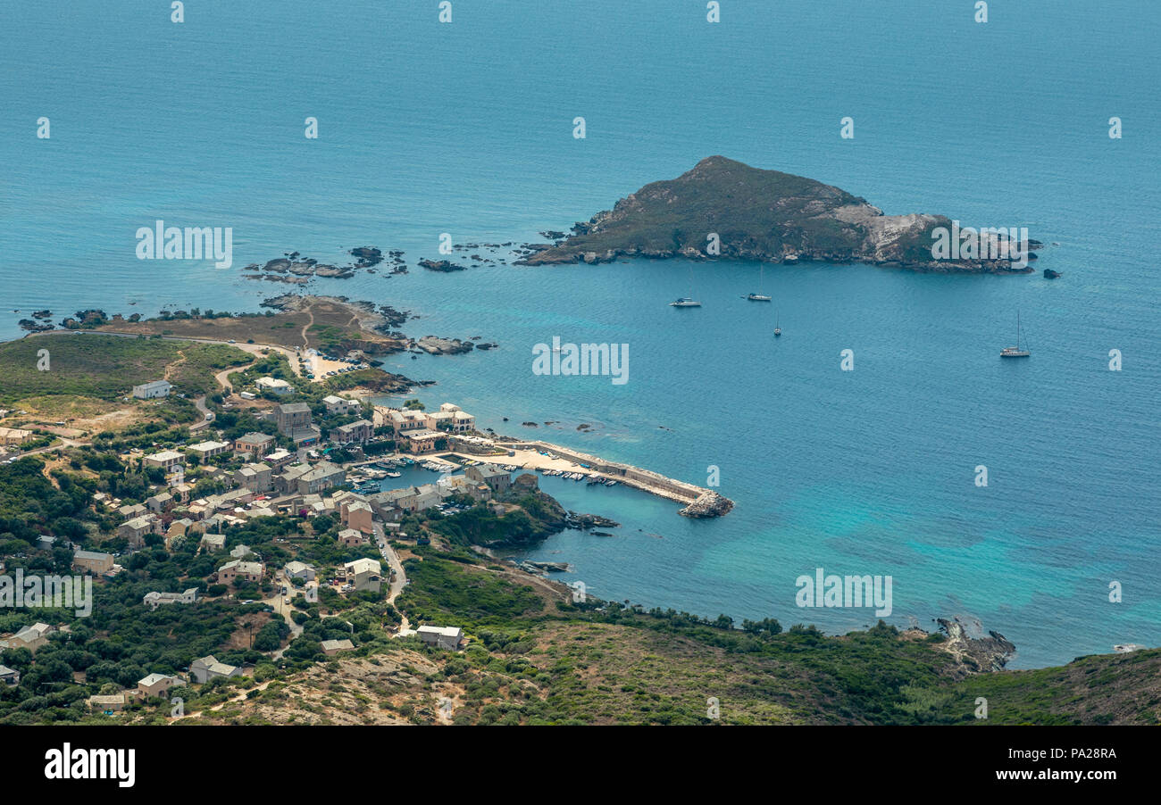 View looking down onto the Port of Centuri and island of Capense and the coast of Cap Corse in northern Corsica Stock Photo