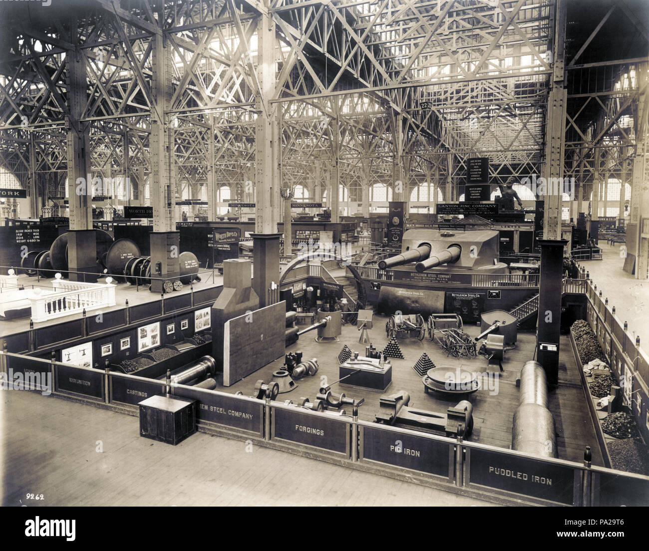 199 Bethlehem Steel Company exhibit in the Palace of Mines and Metallurgy at the 1904 World's Fair. (Statue of Vulcan (Alabama exhibit) in far right background) Stock Photo