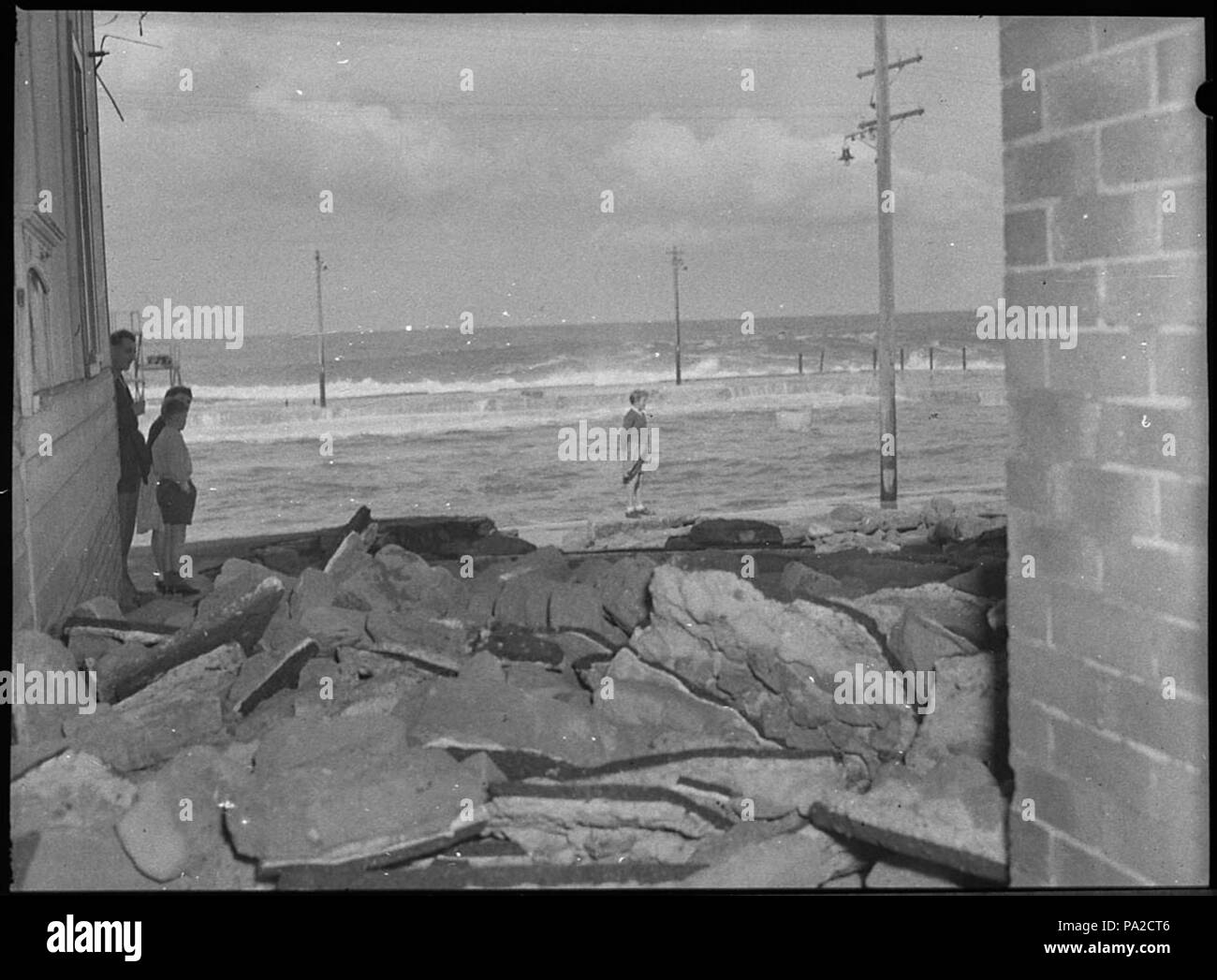 257 SLNSW 32615 Damage to baths caused by heavy seas Stock Photo